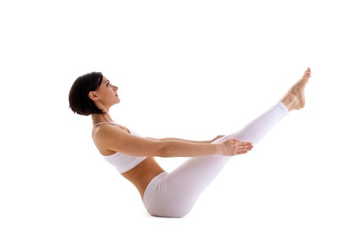 Boat - another one of the great yoga poses for flat abs