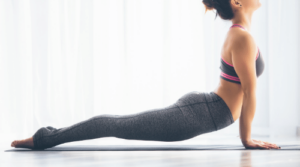 woman doing yoga pose for weight loss featured