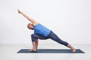 extended side angle #16 of the yoga poses for beginners