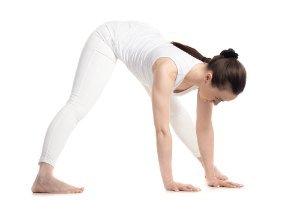 wide legged forward bend yoga pose for flexibility