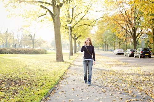 woman walking to lose weight and stop boredom eating