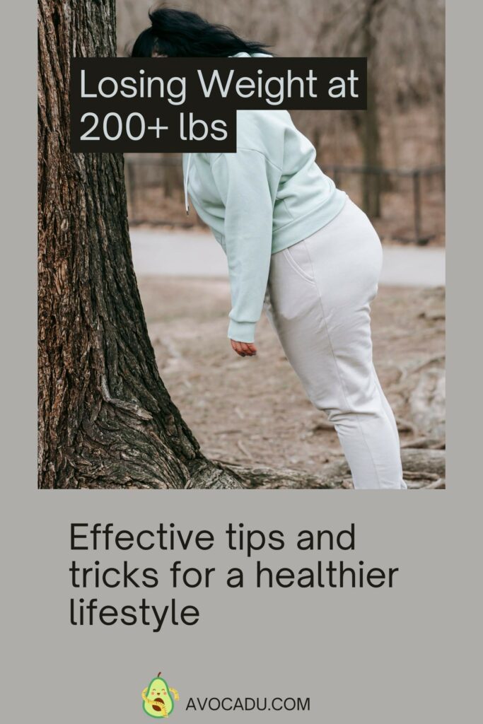 women weight over 200 lbs leaning on a tree