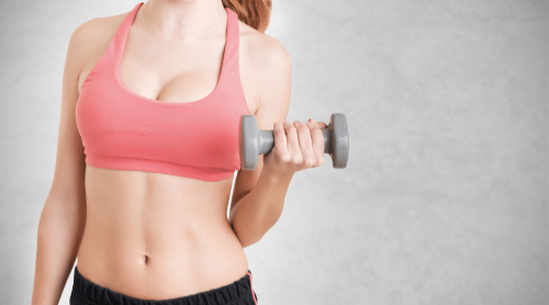 woman lifting dumbbell working out featured