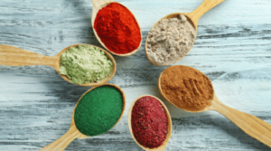 superfood powders on spoons featured