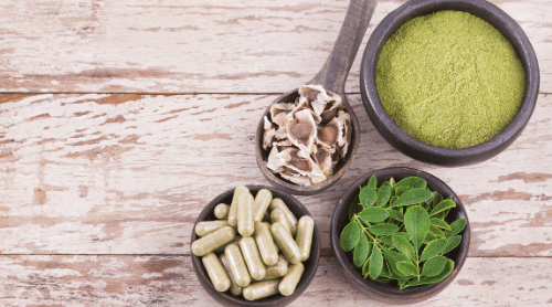 moringa pills, powder, leaves, and seeds featured