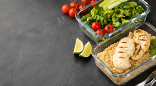 chicken meal prepped in containers example featured