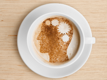 latte art head with gears in brain