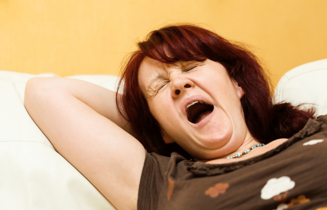 Tired Woman Yawning