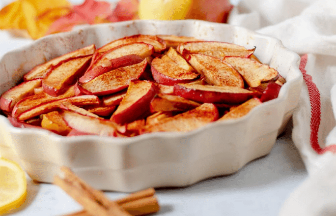 baked apple slices in pastry dish