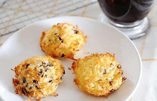 three chocolate chip coconut cookies on white plate