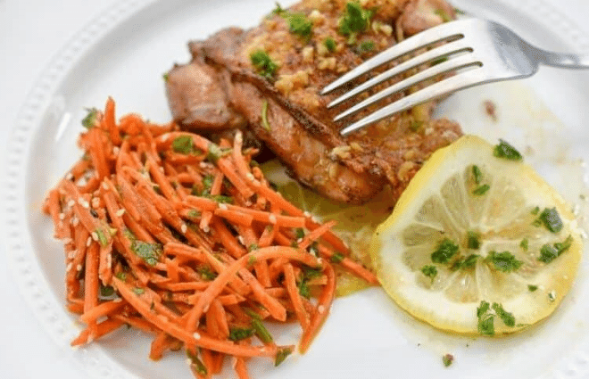 keto citrus chicken with carrot salad and lemon slice