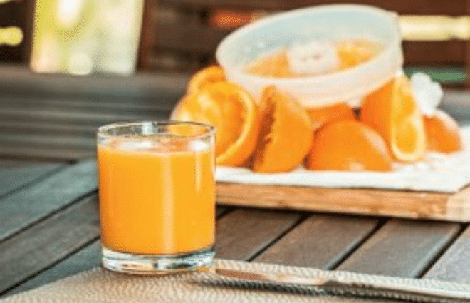 fresh squeezed orange juice and juicer