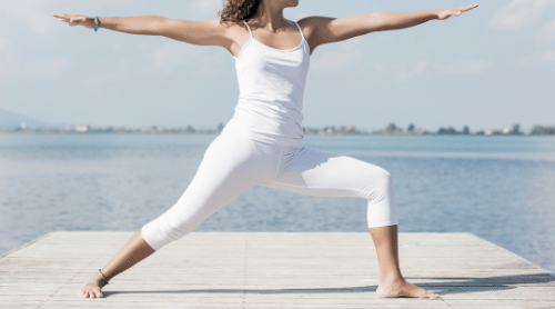 Woman doing therapeutic yoga post for health, featured