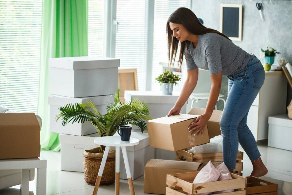 Strength Training for Women moving boxes