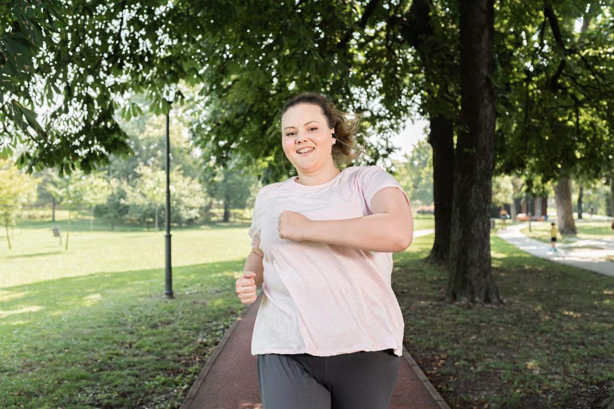 Weight Loss Misconceptions large woman running and healthy