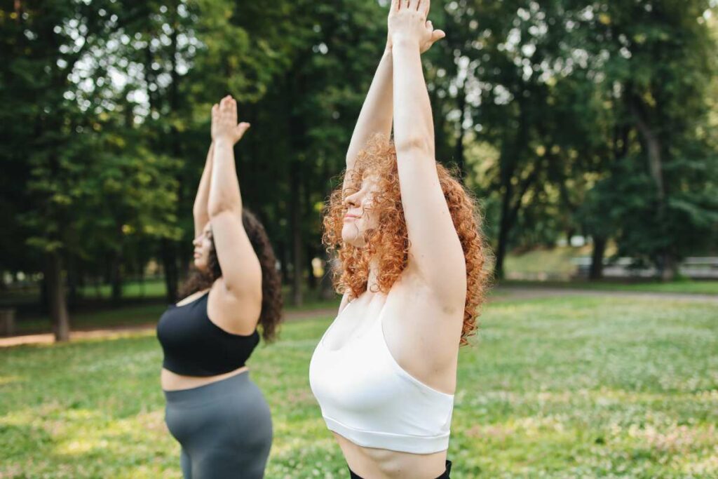 yoga can help you relax 2 women doing yoga