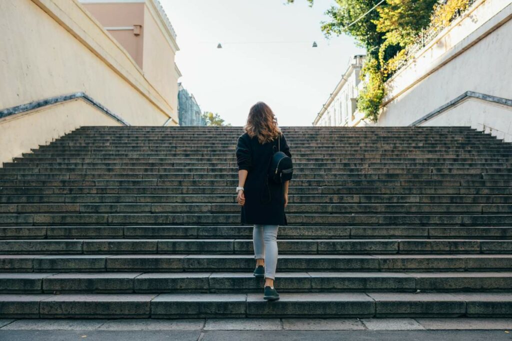 Women's Bone Health walking up stairs