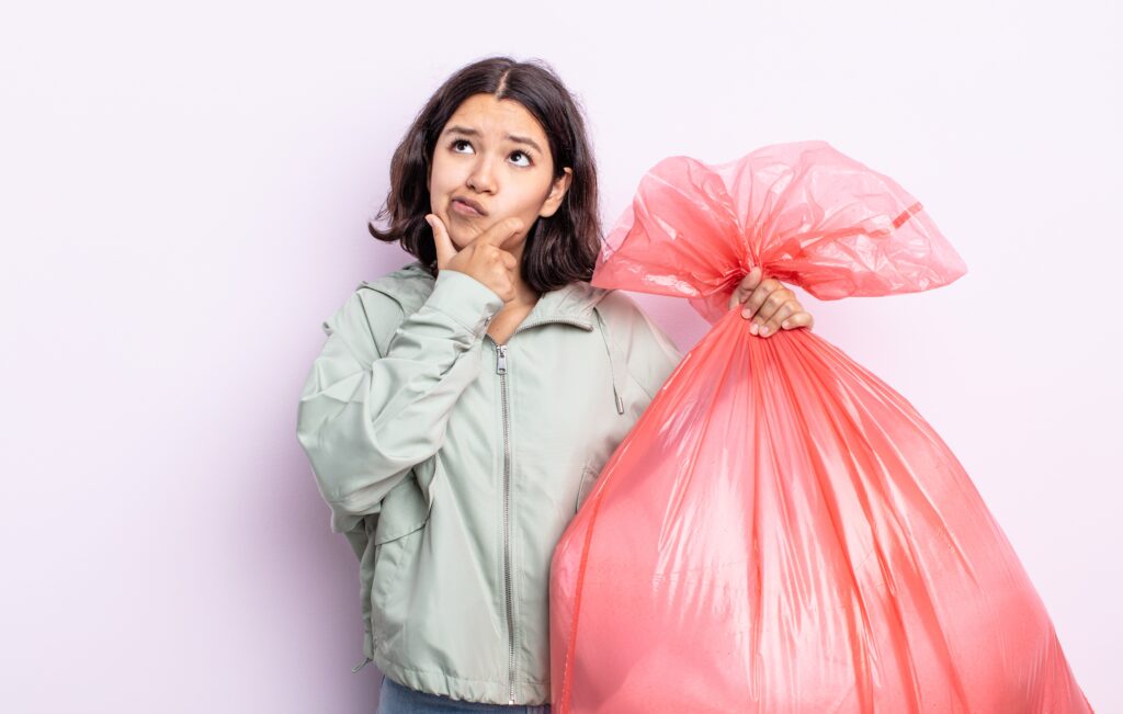 a woman holding plastic bag
