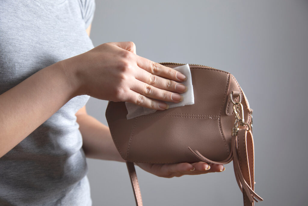 woman cleaning her bag